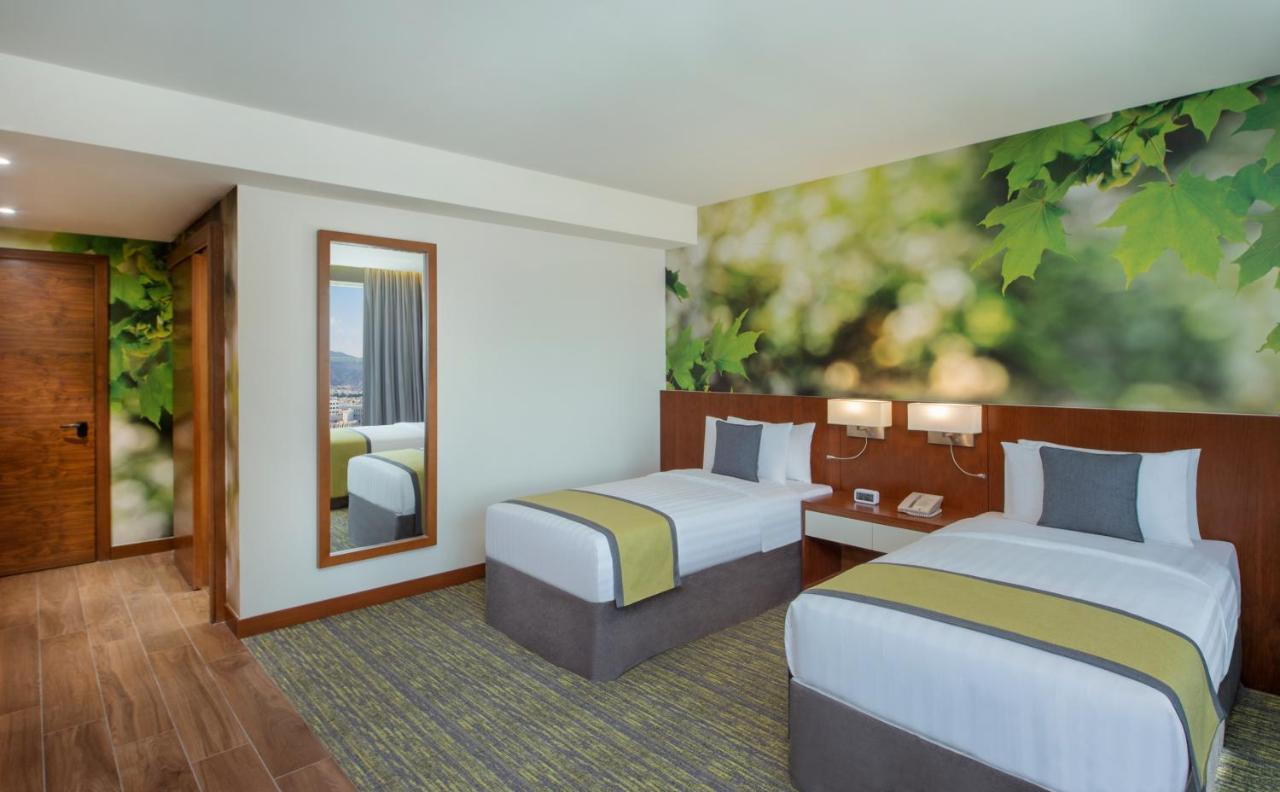Отель Wyndham Garden Muscat Al Khuwair Экстерьер фото